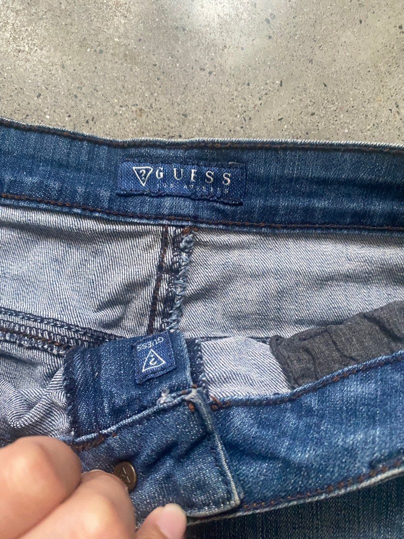 Guess Denim Skirt Size 27 (Category: Skirts) located in Quezon City. Submitted by maravia (Listing ID 1395342682, Image 2). Description: - Authentic Guess denim skirt - Size 27 - Medium wash blue color - Raw hem - Classic design - Made with 95% cotton and 5% spandex - Two front and two back pockets - Guess logo on back pocket.