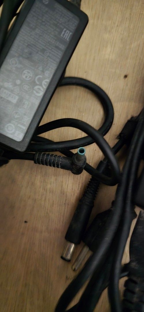 HP Laptop Charger (Category: Chargers) located in Taguig. Submitted by 45selections (Listing ID 1395159620, Image 3). Description: - HP laptop charger - Includes power cable - Black color - Round connector For HP Pavillion 360 and HP Compaq and similar laptops with similar ports GCash or GoTyme. Shipping fee c/o buyer.