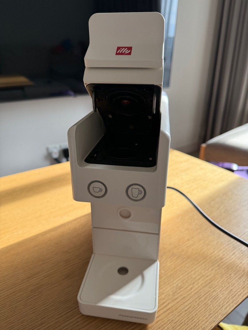 Illy coffee machine (Category: Coffee Machines & Makers) located in Kuala Lumpur. Submitted by aries_331 (Listing ID 1395257543, Image 2). Description: - Illy coffee machine - Modern and stylish design - In good condition - Easy to use - Brews delicious coffee.