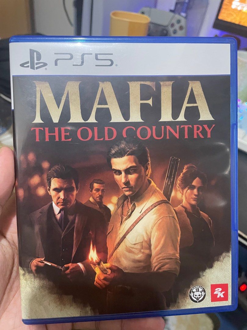 Mafia: The Old Country - PS5 (Category: PlayStation) located in Muntinlupa City. Submitted by dormammu83 (Listing ID 1395177659, Image 1). Description: - Mafia: The Old Country for PlayStation 5 - RFS: Done playing - Game is in its original case.