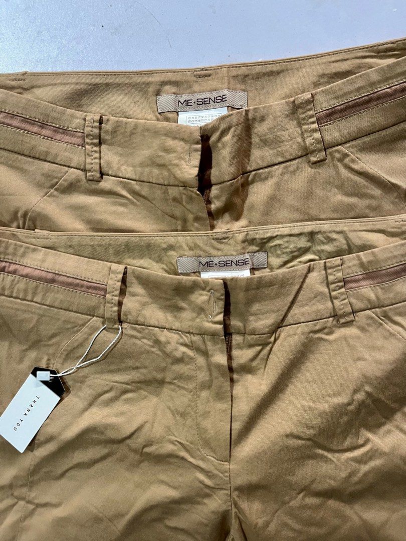 Me Sense Khaki Pants (Category: Other Bottoms) located in Quezon City. Submitted by mdmshops (Listing ID 1395167735, Image 1). Description: - Me Sense khaki pants - Straight leg cut - Brown accent on pockets - Includes 'Thank You' tag.