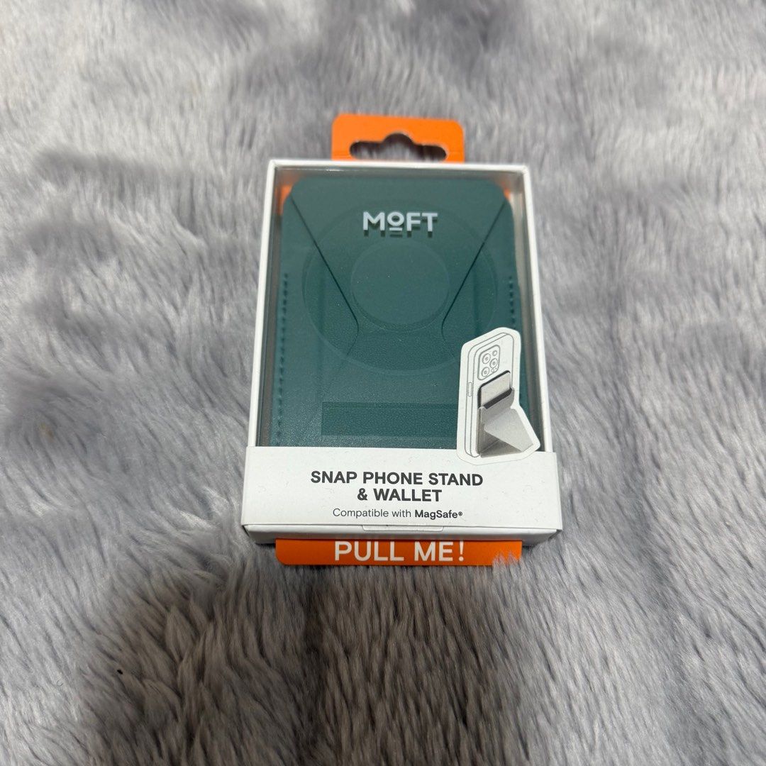 Moft Snap-on Phone Stand & Wallet (Category: Mounts & Holders) located in Quezon City. Submitted by jshoppppp (Listing ID 1395221452, Image 2). Description: New, sealed box. Color: Jungle Dimensions: 3.7*2.5*0.23 in/96*65*6mm mm BPI, BDO, Gcash Delivery c/o buyer.