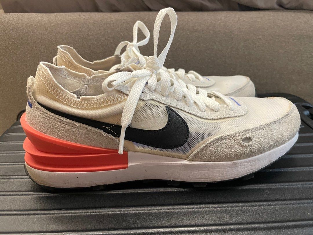 Nike Waffle One Sneakers - US 8 (Category: Sneakers) located in Taguig. Submitted by BellaC (Listing ID 1395255329, Image 2). Description: - Nike Waffle One sneakers - Color: Cream and Black - Size: US 8 - Mesh upper with suede overlays - Distinctive orange heel counter - White midsole - Black waffle outsole - Blue insoles with white Nike branding.