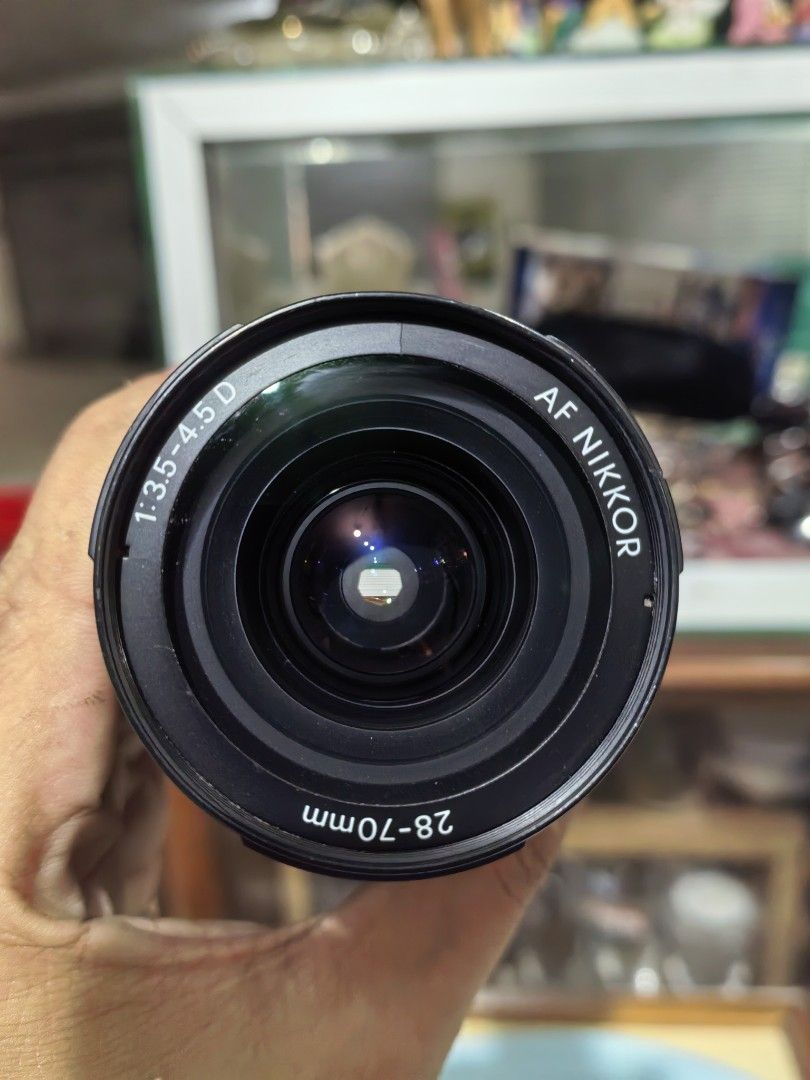 Nikon AF NIKKOR (Category: Lens & Kits) located in Cebu City. Submitted by dudes_villanueva (Listing ID 1395336285, Image 3). Description: Nikon AF NIKKOR 📌28-70mm f/3.5-4.5 D Macro Autofocus Lens. 📌Versatile Zoom Range: It offers a focal length range of 28-70mm, suitable for capturing various subjects from landscapes to portraits. 📌Macro Capabilities: The lens allows for close-up photography with a minimum focusing distance of 1 foot. 📌Const