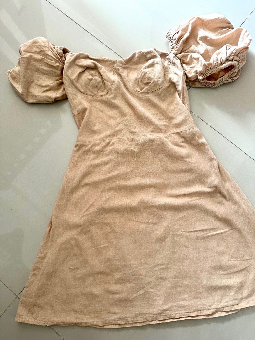 Off-Shoulder Puff Sleeve Dress (Category: Dresses) located in Manila. Submitted by cazly (Listing ID 1395215759, Image 3). Description: - Off-shoulder design - Puff sleeves - Fitted bodice - Flared skirt - Mini length - Neutral beige color - Textured fabric.