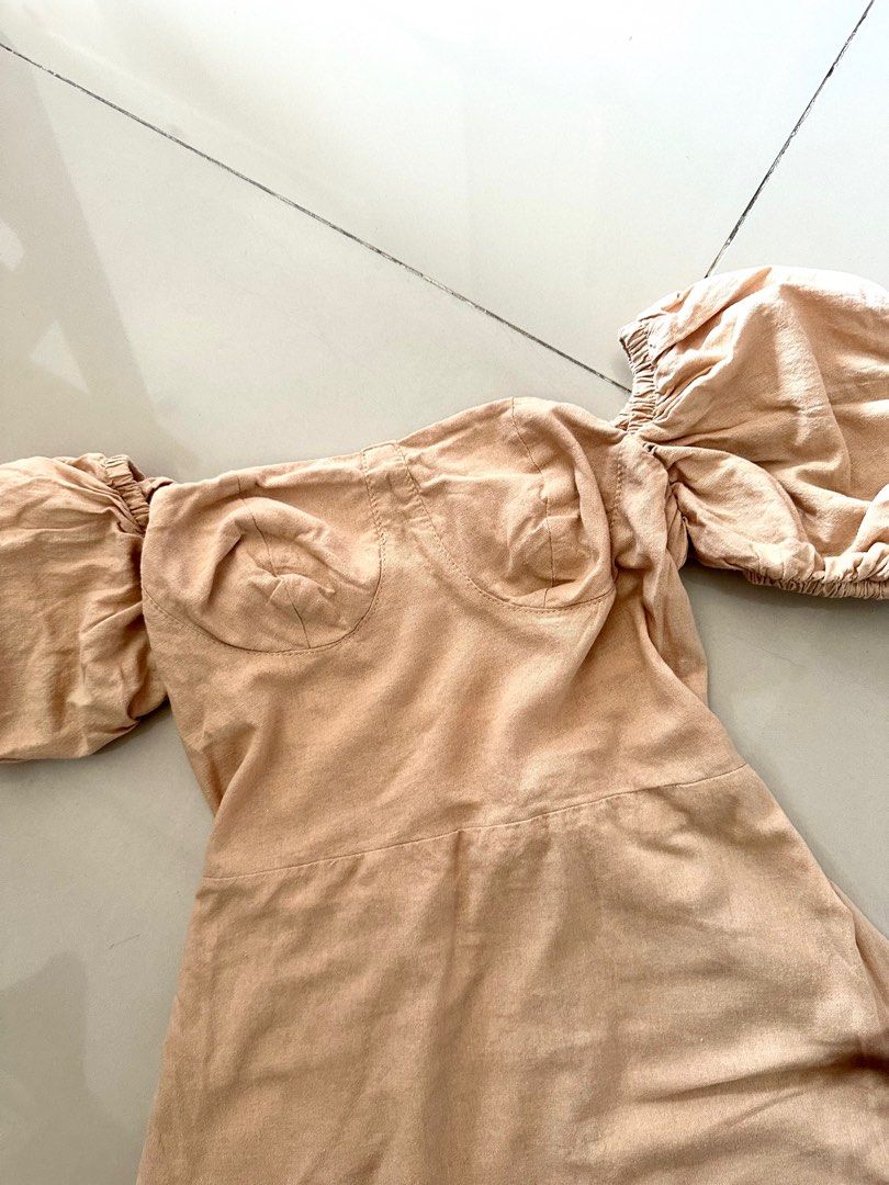 Off-Shoulder Puff Sleeve Dress (Category: Dresses) located in Manila. Submitted by cazly (Listing ID 1395215759, Image 1). Description: - Off-shoulder design - Puff sleeves - Fitted bodice - Flared skirt - Mini length - Neutral beige color - Textured fabric.