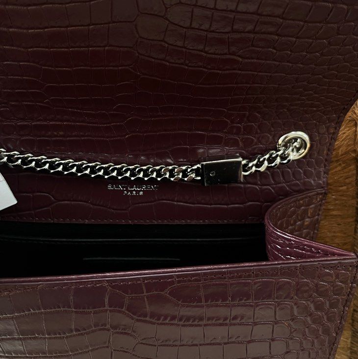Saint Laurent Kate Sunset Croc-Embossed Chain Bag (Category: Luxury Bags & Wallets) located in Quezon City. Submitted by hush_lowkey (Listing ID 1395184337, Image 3). Description: - Saint Laurent Sunset chain bag - Deep burgundy croc-embossed leather - Silver-tone chain strap - Iconic YSL logo - Includes dust bag and authenticity card - Single interior compartment.