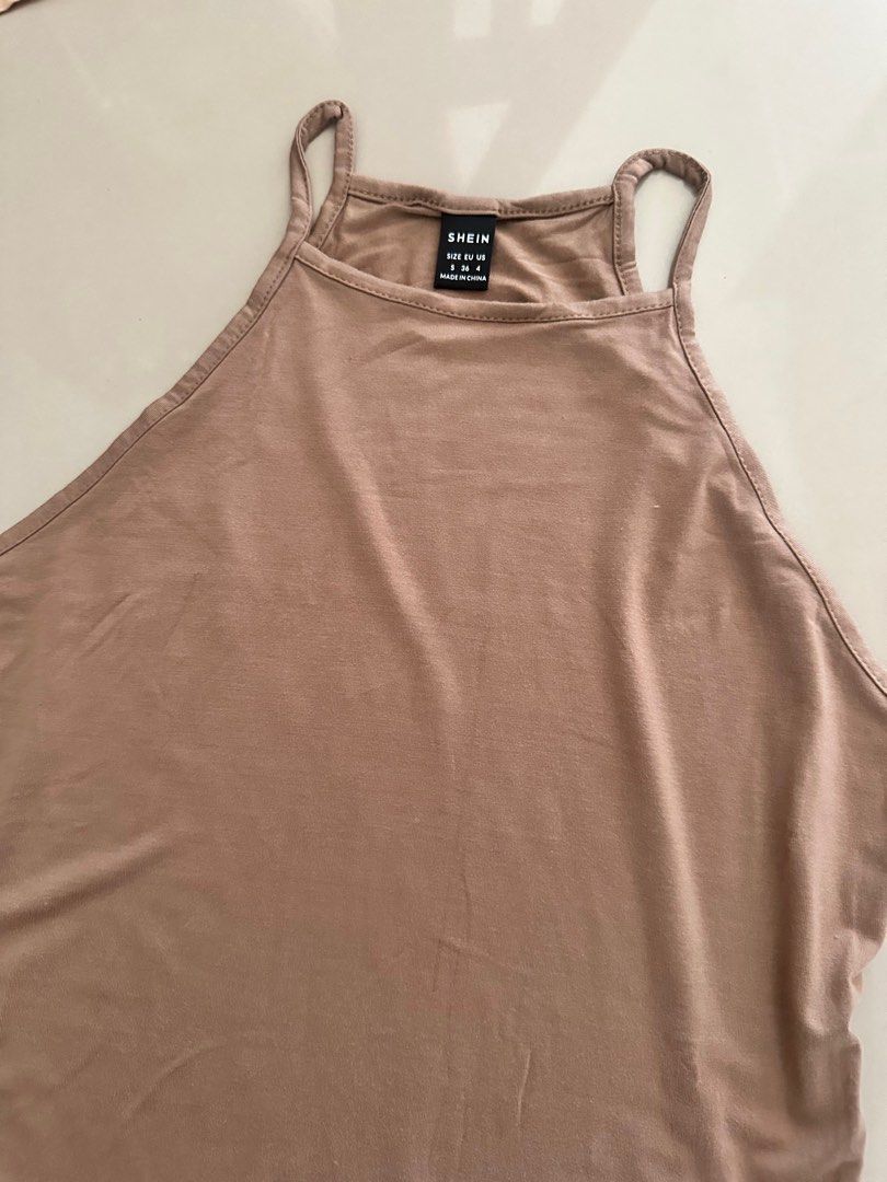 SHEIN Halter Neck Bodysuit - Size S (Category: Others Tops) located in Manila. Submitted by cazly (Listing ID 1395211049, Image 2). Description: Never used!! - SHEIN Halter Neck Bodysuit - Color: Brown - Size: S - Features a thong bottom - Made in China - Simple and versatile design.
