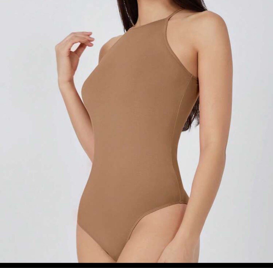 SHEIN Halter Neck Bodysuit - Size S (Category: Others Tops) located in Manila. Submitted by cazly (Listing ID 1395211049, Image 1). Description: Never used!! - SHEIN Halter Neck Bodysuit - Color: Brown - Size: S - Features a thong bottom - Made in China - Simple and versatile design.