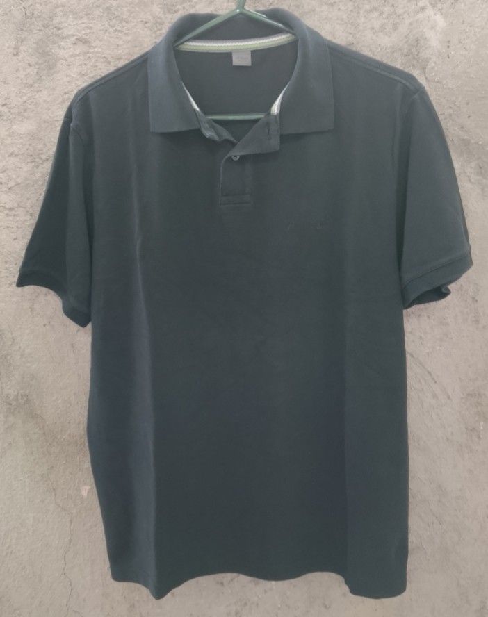 s.oliver Premium Polo Shirt (Category: Tshirts & Polo Shirts ) located in Marikina City. Submitted by hals1995 (Listing ID 1395163511, Image 2). Description: - s.Oliver Premium polo shirt - Color: Black (not faded) - Collar with gray, white, and neon green stripes - Knit fabric - Brand label visible - 21" chest - shipped (+50 vismin).