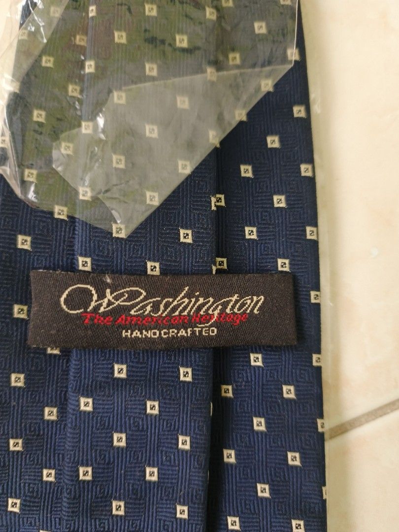 Ties (Category: Ties) located in Balakong. Submitted by lpink (Listing ID 1395190928, Image 3). Description: - Navy blue tie by CW Pashington (square pattern) - Red tie by My Tier (striped pattern) - Both ties made of polyester - Perfect for formal events or adding a sophisticated touch. - Both for RM38 cod..