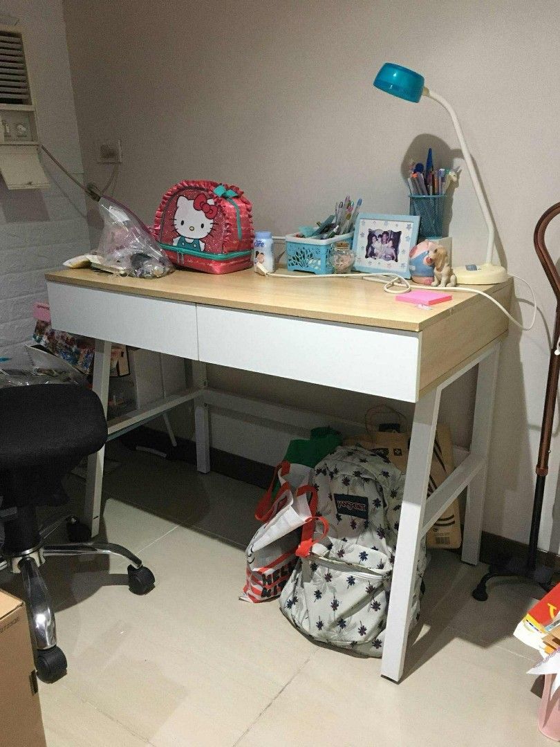 White and Wood Computer Desk (Category: Tables & Sets) located in Pasig City. Submitted by reportpad908761 (Listing ID 1395188558, Image 2). Description: Desktop Table P3500 (Negotiable) - White frame computer desk - Light wood-colored tabletop - Two storage drawers - Minimalist design - Ideal for home office or study - Ample space for work and gaming essentials Additional notes: *used but still in good condition *minimal dents, does not affect t