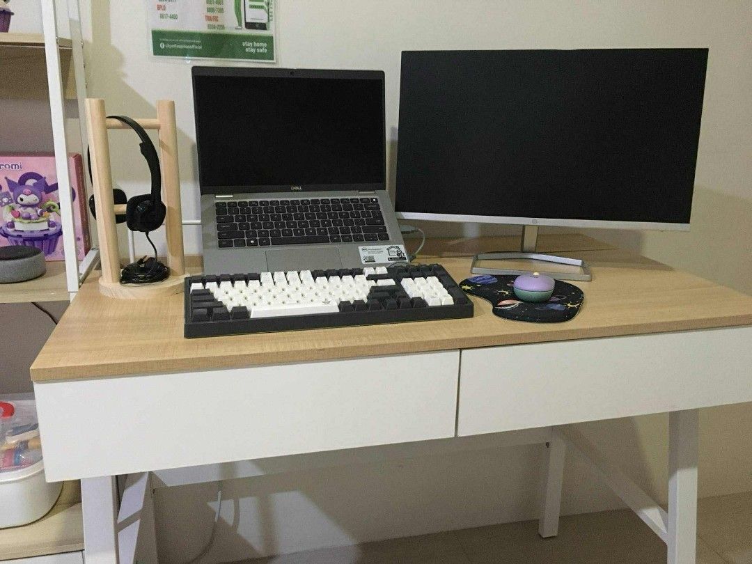 White and Wood Computer Desk (Category: Tables & Sets) located in Pasig City. Submitted by reportpad908761 (Listing ID 1395188558, Image 1). Description: Desktop Table P3500 (Negotiable) - White frame computer desk - Light wood-colored tabletop - Two storage drawers - Minimalist design - Ideal for home office or study - Ample space for work and gaming essentials Additional notes: *used but still in good condition *minimal dents, does not affect t