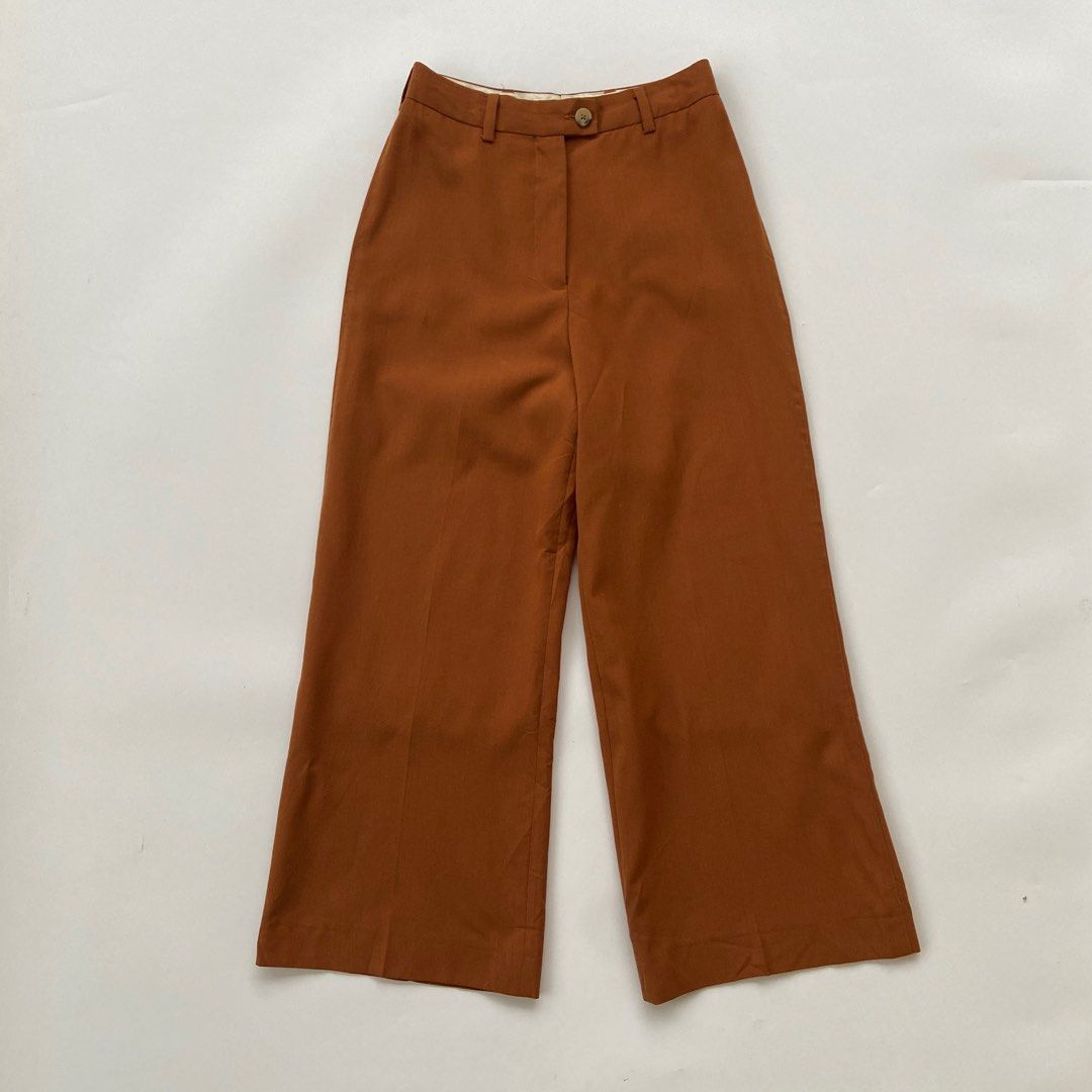 Acne Studios - Wide Trouser Pants (Category: Other Bottoms) located in Iloilo. Submitted by 50houndidz (Listing ID 1395461997, Image 1). Description: Acne Studios - Wide Trouser Pants Excellent No issue Size: 32 Measurements: 26 waistline 36 length 11.5 leg opening .