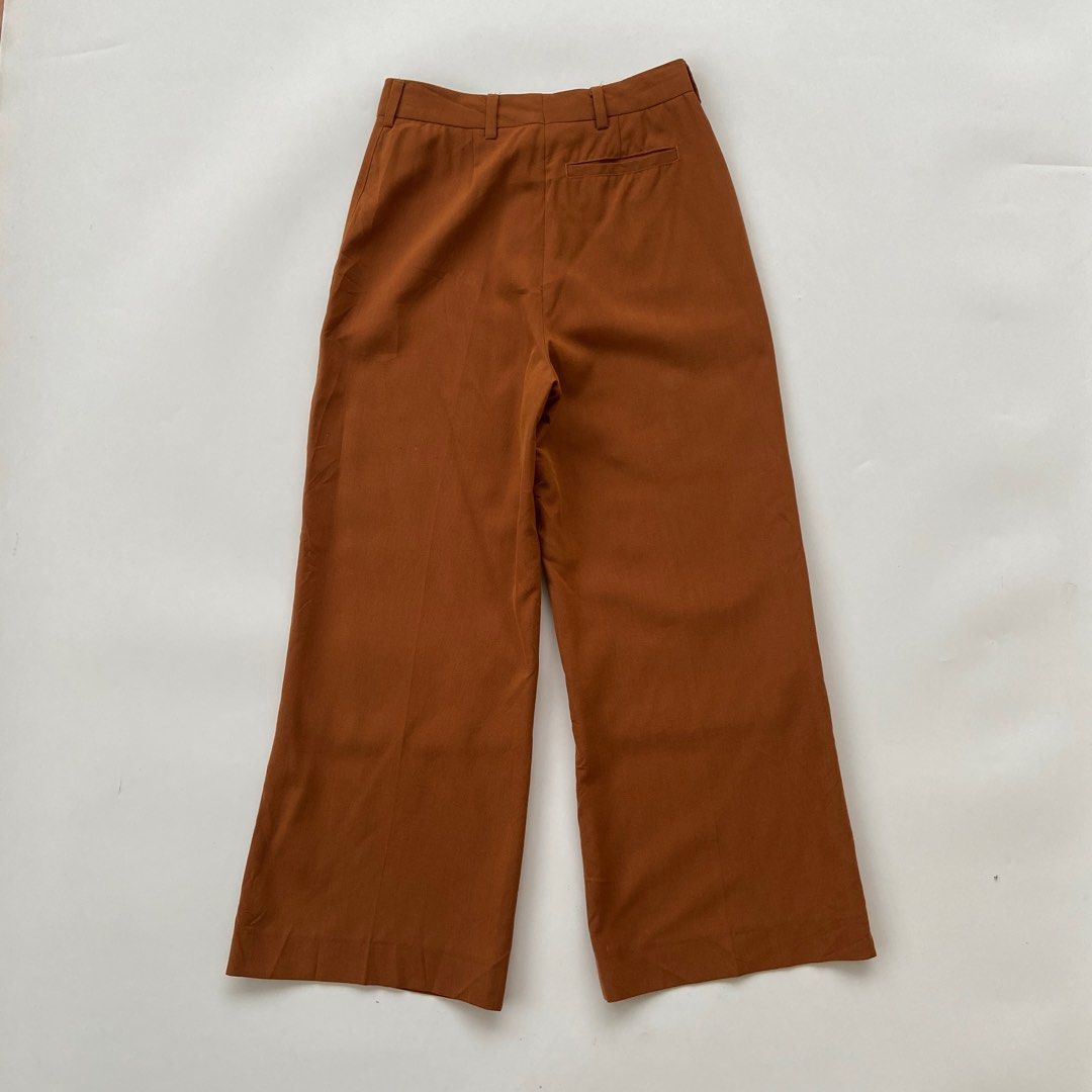 Acne Studios - Wide Trouser Pants (Category: Other Bottoms) located in Iloilo. Submitted by 50houndidz (Listing ID 1395461997, Image 2). Description: Acne Studios - Wide Trouser Pants Excellent No issue Size: 32 Measurements: 26 waistline 36 length 11.5 leg opening .