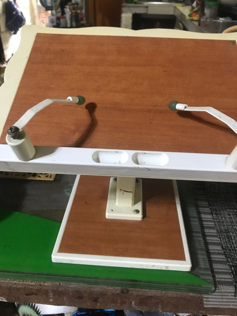 Adjustable Wooden Laptop Table (Category: Tables & Sets) located in Manila. Submitted by noemiaspa1702 (Listing ID 1395350060, Image 1). Description: - Adjustable laptop table - Wooden surface, white frame - Tilting mechanism - Height adjustable - Comfortable for work/study - Sturdy and functional.