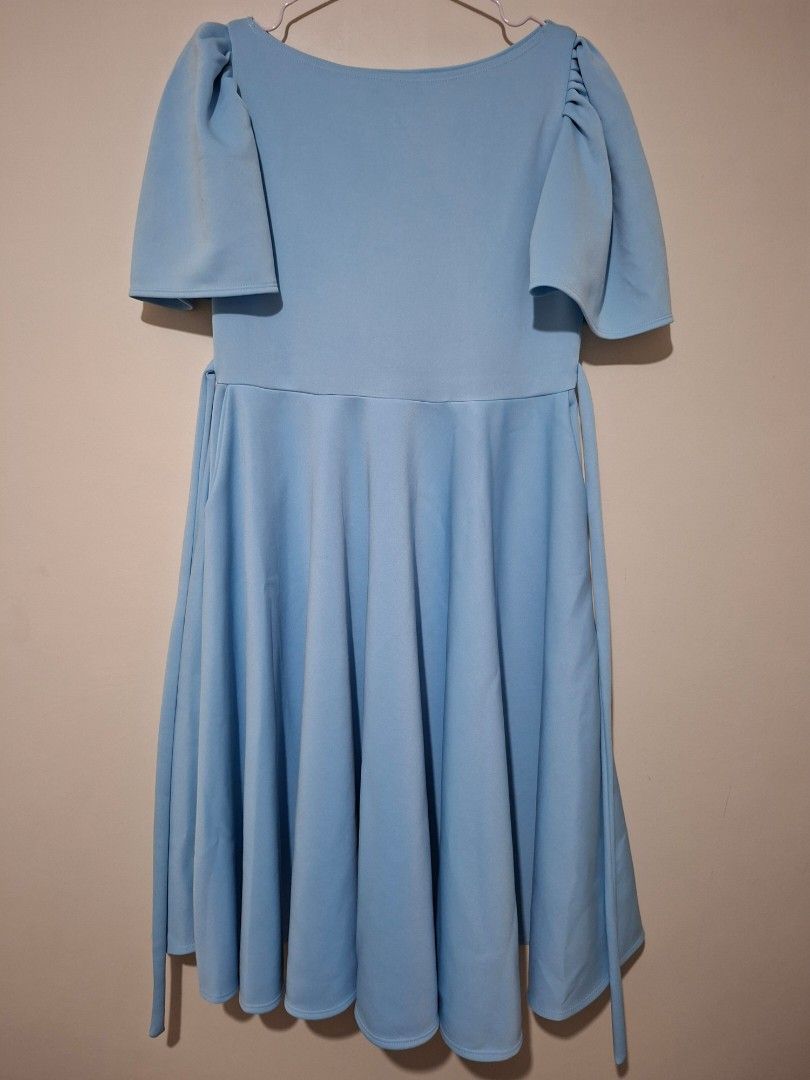 Baby Blue Dress with Flutter Sleeves (Category: Dresses) located in Pasay City. Submitted by Tini_winnie (Listing ID 1395488706, Image 1). Description: - baby blue dress - flutter sleeves, with waist tie, 2 side pockets - Slightly stretchy - Flowing skirt - neoprene fabric - Suitable for various occasions - armpit 18" waist 17" length 42".