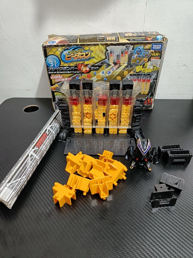 B-daman Crossfire Battle Set (Category: Action & Battle Toys) located in Caloocan City. Submitted by than-9 (Listing ID 1395538798, Image 3). Description: Missing 1 black piece and zone paper. Break Bomber Battle Set.