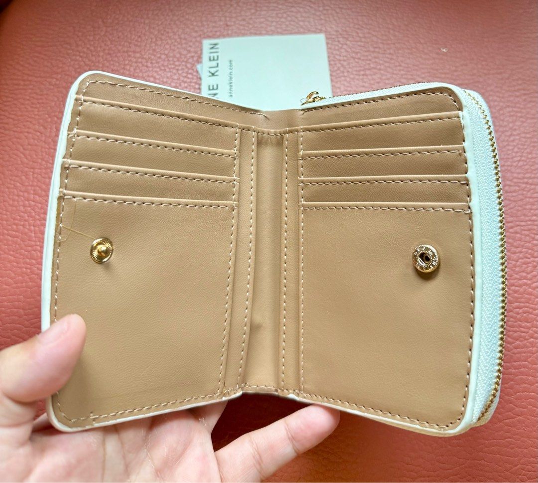 BN/Unused Anne Klein bifold wallet (Category: Wallets & Card holders) located in Cainta. Submitted by jdcmd (Listing ID 1395441270, Image 2). Description: Unused still with tag and plastic cover on hardwares SF co buyer via lalamove, grab, lbc or gogo xpress No cod/cop of item Payment first Gcash or bank transfer Shipping from Cainta.