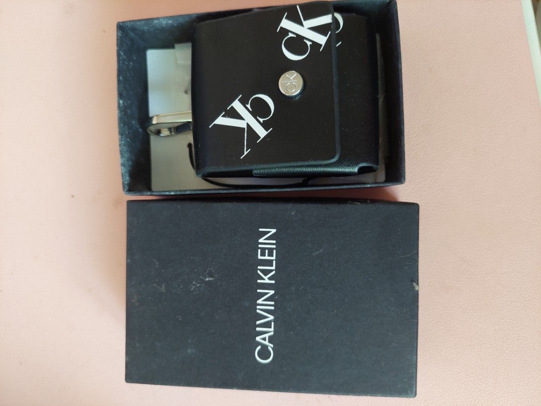 Calvin Klein Airpods Case (Category: Portable Audio Accessories) located in Sorsogon. Submitted by sharpaye (Listing ID 1395378466, Image 3). Description: Calvin Klein Airpods Case Comes with original box and packaging RFS: never used.