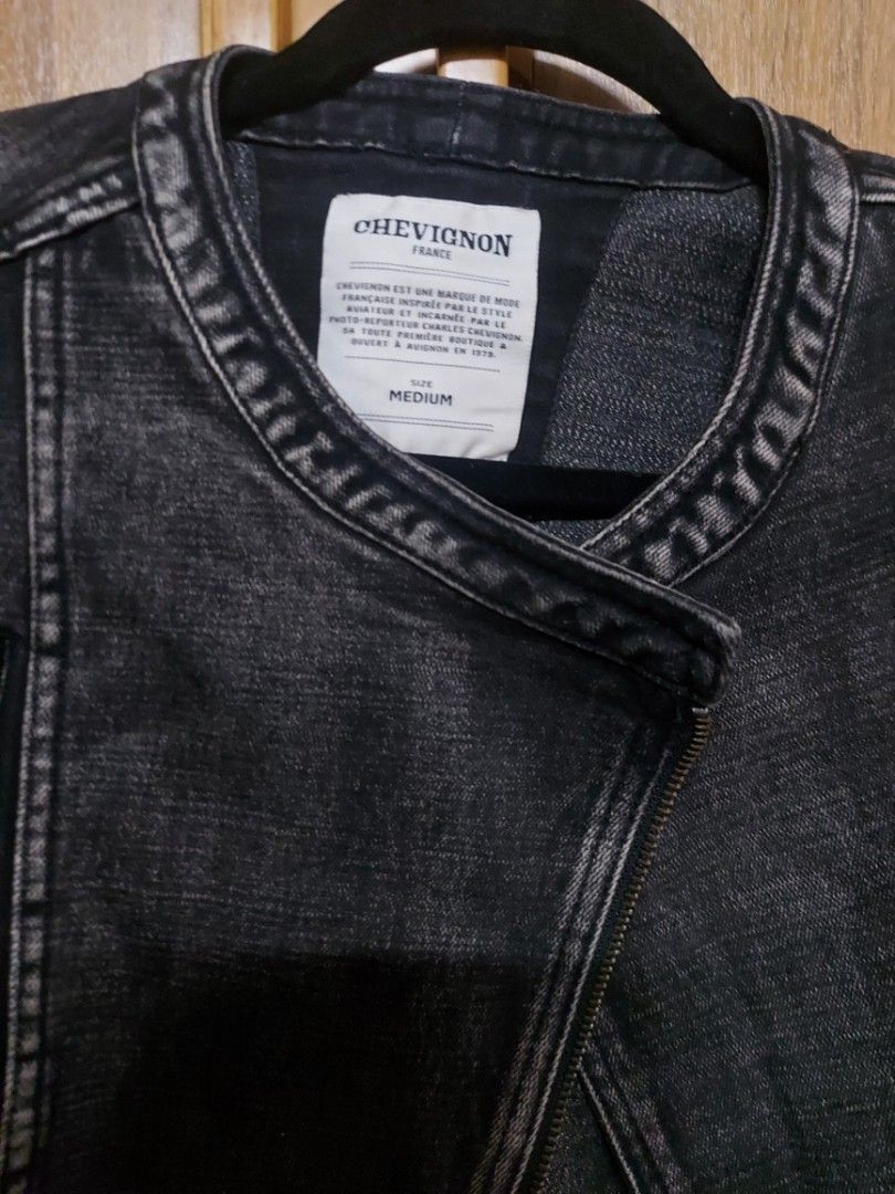 Chevignon Denim Jacket - Medium (Category: Coats, Jackets and Outerwear) located in Rizal. Submitted by noblewolf_0c9e41 (Listing ID 1395464009, Image 2). Description: - Chevignon denim jacket - Classic design - Medium size - Dark grey wash - Zip-up front - Multiple pockets - Tailored fit used once quezon city.. shipping at buyer's expense..