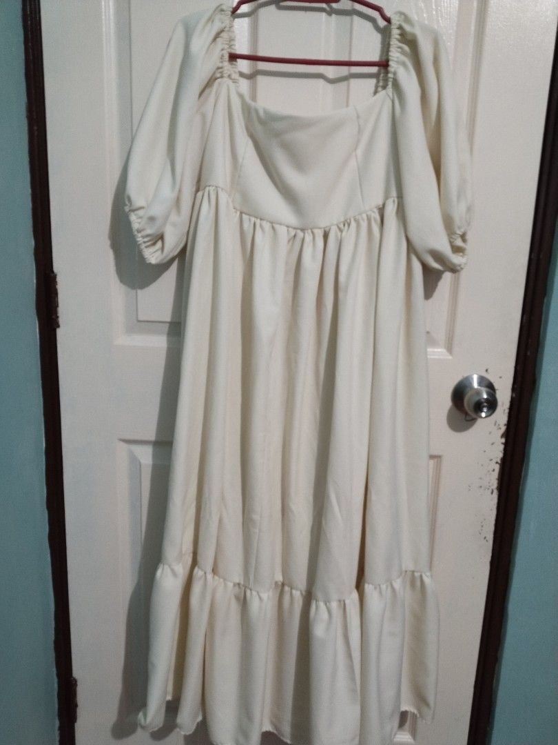 Cream Puff Sleeve Maxi Dress (Category: Dresses) located in Quezon City. Submitted by jholouise (Listing ID 1395412200, Image 2). Description: - Cream maxi dress - Puff sleeves - Square neckline - Fitted bodice - Flowing, tiered skirt - Ideal for special occasions -Best fit L-XL -Back is garterized -Very comfy to wear.