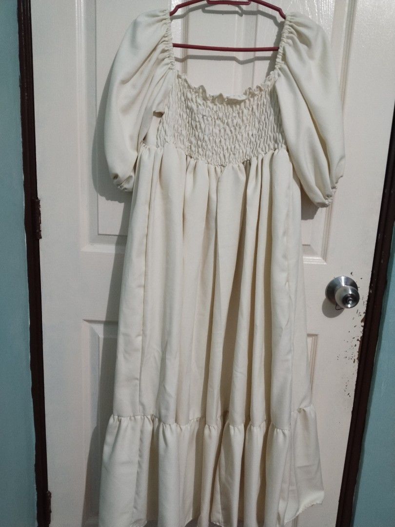 Cream Puff Sleeve Maxi Dress (Category: Dresses) located in Quezon City. Submitted by jholouise (Listing ID 1395412200, Image 3). Description: - Cream maxi dress - Puff sleeves - Square neckline - Fitted bodice - Flowing, tiered skirt - Ideal for special occasions -Best fit L-XL -Back is garterized -Very comfy to wear.