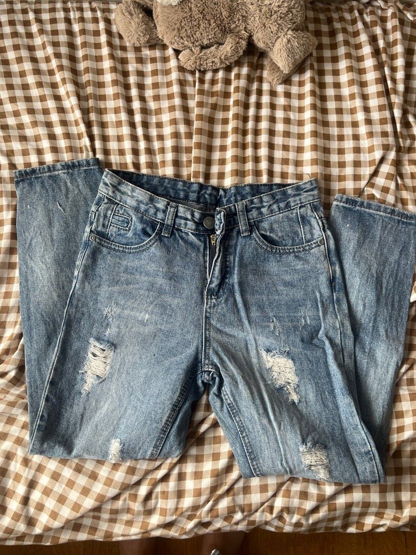 Distressed Jeans (Category: Jeans) located in Manila. Submitted by nasch (Listing ID 1395389339, Image 2). Description: - Light blue distressed jeans - Straight leg cut - Button closure and zipper - Small front pocket - Two back pockets - Brown leather patch at the back.