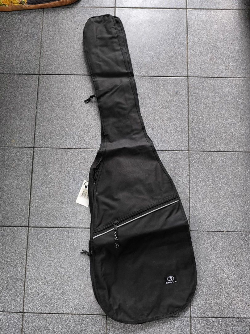 Electric Bass Guitar Bag (Category: Musical Instruments) located in Manila. Submitted by lianlim.mail (Listing ID 1395454503, Image 1). Description: - Black guitar bag/case - for bass / electric or pag manipis na acoustic siguro kasya din. see pic for measurements - Zipper closure - Reflective stripe - Handle and shoulder/backpack style straps - Zippered pocket - Approximately 47" length x 13" width - Brand new, signs of storage only. - 10 pcs av