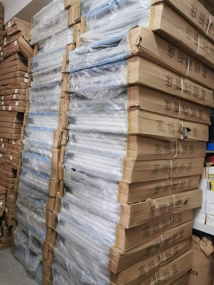 Folding Bed with Striped Mattress (Category: Bed Frames & Mattresses) located in Manila. Submitted by ncledlcrz (Listing ID 1395378180, Image 2). Description: - White metal frame folding bed - Mattress with blue and beige stripes - Dimensions: 180cm (length) x 75cm (width) x 40cm (height) - Foldable design for convenient storage - Ideal for small spaces and guest use.