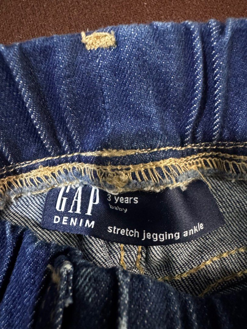 Gap Denim Stretch Jegging Ankle Jeans - 3 Years (Category: Babies & Kids Fashion) located in Manila. Submitted by geevibes (Listing ID 1395423949, Image 2). Description: Gap Denim stretch jegging ankle jeans, perfect for everyday wear. Dark blue wash, size 3T. Comfortable fit with elastic waistband..