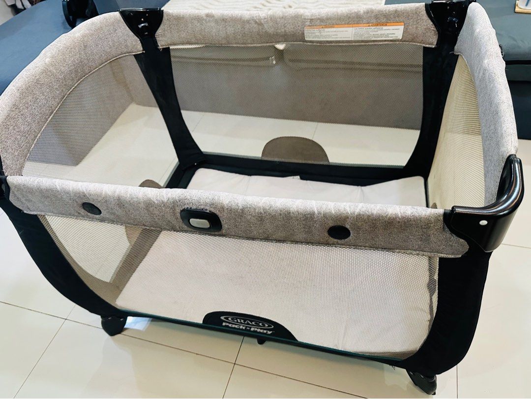 GRACO Travel Playpen crib (Category: Cots & Cribs) located in Manila. Submitted by deezon (Listing ID 1395528098, Image 2). Description: Selling our preloved GRACO playpen crib. No issue, hindi na nagagamit within this year so I am letting it go. Magamit pa ng ibang baby🙏 used but not abused po ito. We usually used this pag nagttravel kami as very handy, easy to pack and assemble and most of all, lightweight. It has 3inch foam included on top of