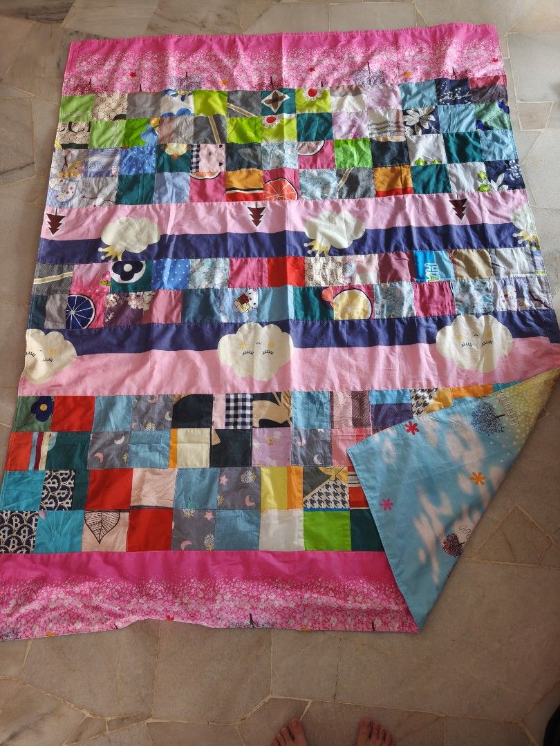 Handmade Patchwork Quilt (Category: Bedding & Towels) located in Singapore. Submitted by vic_kaidou (Listing ID 1395457672, Image 2). Description: - Handmade patchwork quilt - Features colorful fabric squares - Perfect for adding warmth and personality - Unique and one-of-a-kind - 100% cotton handmade 60*75 inches， queen size.