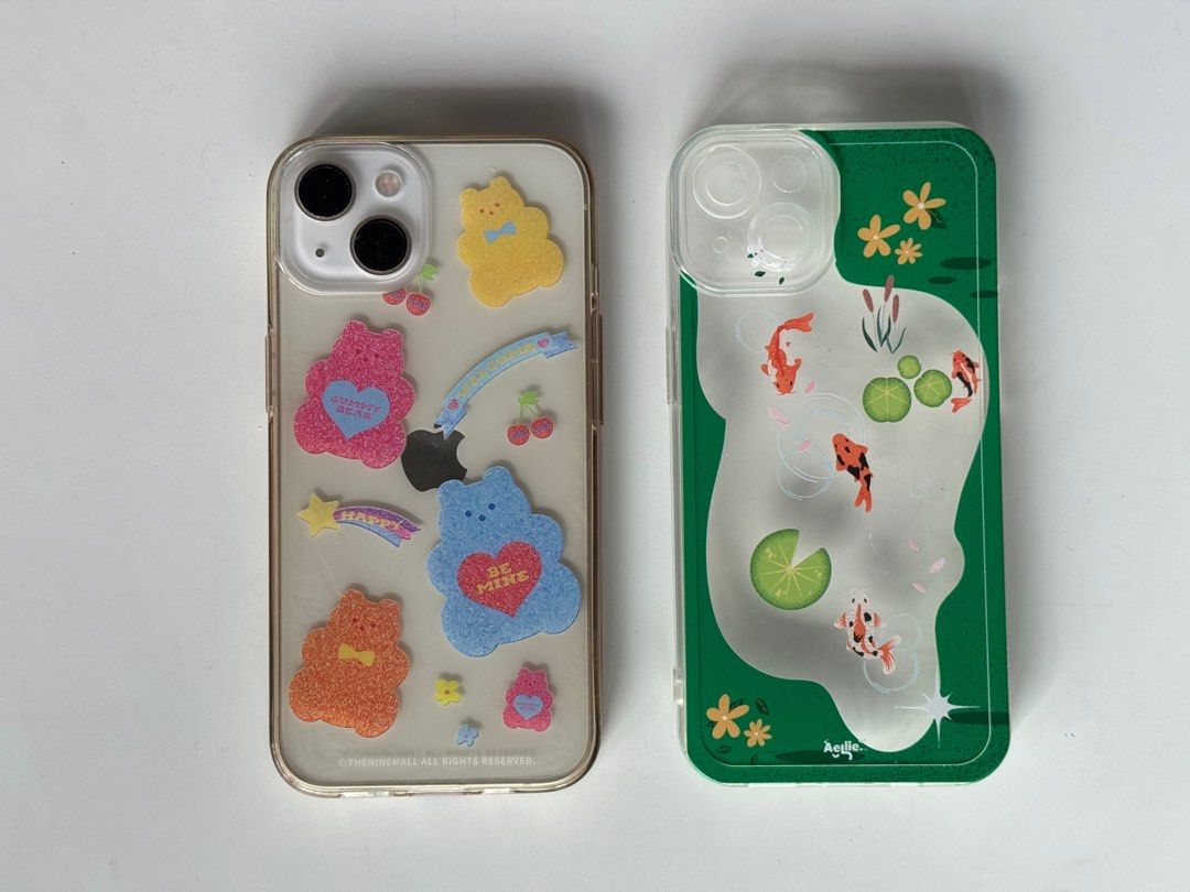 iPhone 13 Clear Phone Cases - earpearp & aellie (Category: Cases & Sleeves) located in Quezon City. Submitted by maejichoco (Listing ID 1395443214, Image 1). Description: ₱250 SET for both! earpearp bear iphone 13 case (korean brand) - well used so pls manage expectations - slightly yellowish (see pic) aellie koi fish pond iphone13 case - 8/10 condition - no yellowish stains - only used for less than a month.