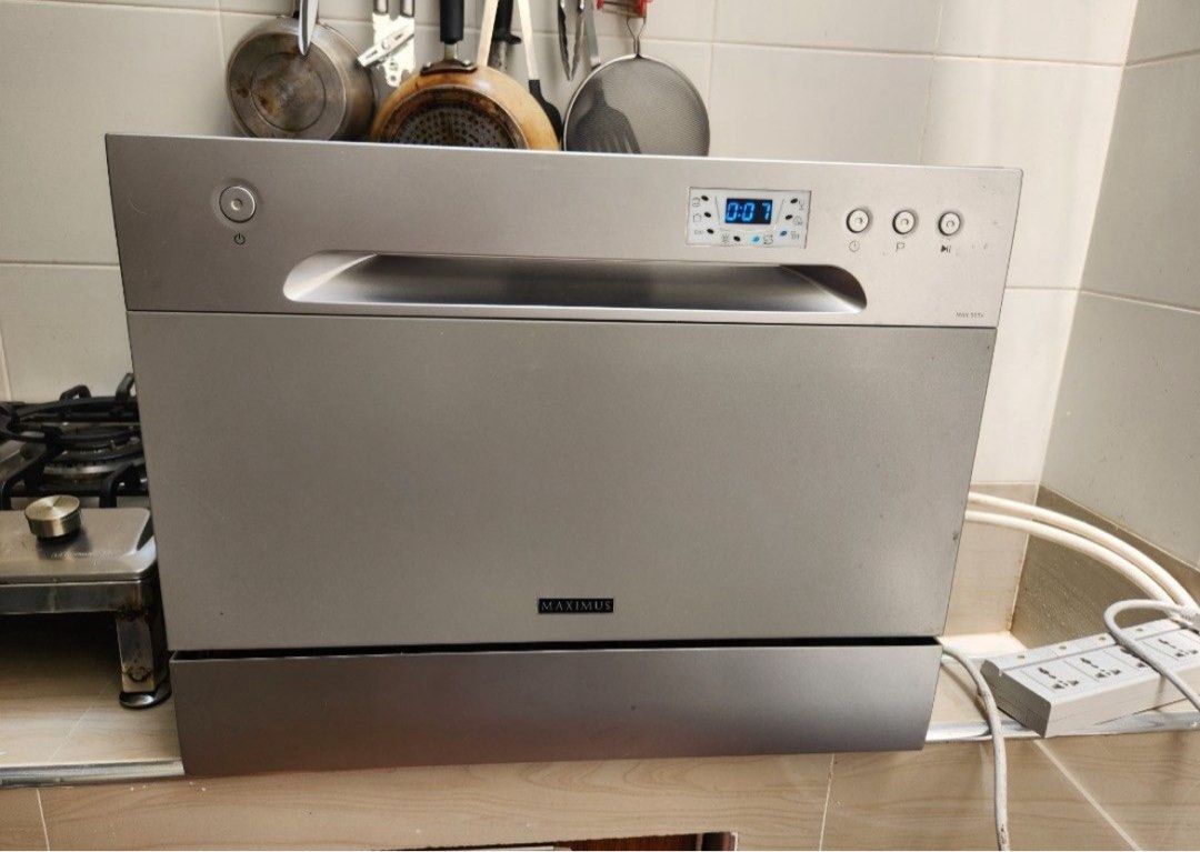Maximus Dishwasher (Category: Dishwasher) located in Manila. Submitted by marvintaye39811 (Listing ID 1395500889, Image 2). Description: - Compact Maximus dishwasher ORIG PRICE Php17,000 - Great Condition - Silver color - Digital display and control buttons - Includes detergent dispenser - Racks for dishes, cutlery, and glasses - Clean and well-maintained interior Slightly negotiable..