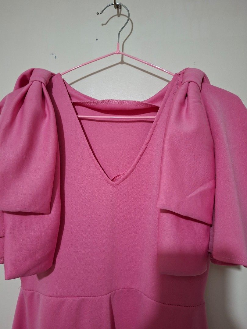 Pink Dress with Ruffle Sleeves (Category: Dresses) located in Pasay City. Submitted by Tini_winnie (Listing ID 1395503039, Image 2). Description: - Pink long dress - V-neckline - Ruffle sleeves - Fitted bodice - Flowing skirt - Solid-colored fabric - Perfect for various occasions - neoprene fabric - check photos for flaws not noticeable - armpit 16" waist 15" length 47" - stretchy fabric.