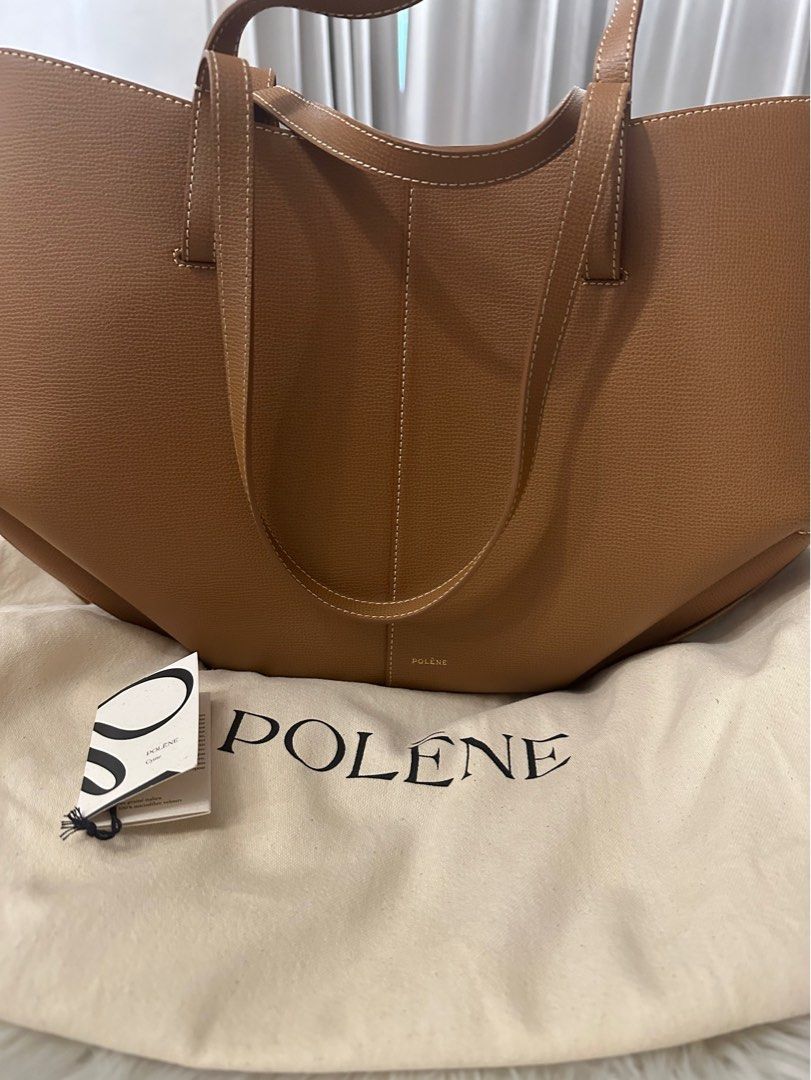 Polene Cyme brandnew (Category: Luxury Bags & Wallets) located in Makati City. Submitted by lms_nat (Listing ID 1395356823, Image 1). Description: Polene Cyme Brand New Regular in Camel With tag and dustbag *no box Can be worn as hand/armbag or shoulder bag. With Magnet side so it Can also open edges to look different (like neverfull style).