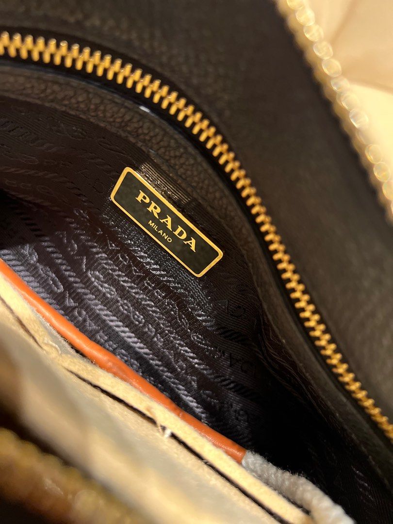 Prada Bauletto Vitello Phenix Black Handbag (Category: Luxury Bags & Wallets) located in Bacoor. Submitted by majezticos (Listing ID 1395496001, Image 3). Description: - Authentic Prada Bauletto handbag - Black Vitello Phenix leather - Gold-tone hardware - Detachable shoulder strap - Multiple interior compartments - Top zip closure - Dual top handles - Includes authenticity cards - Model number: 1BB797 DTI & BIR Registered Business Location : Bac