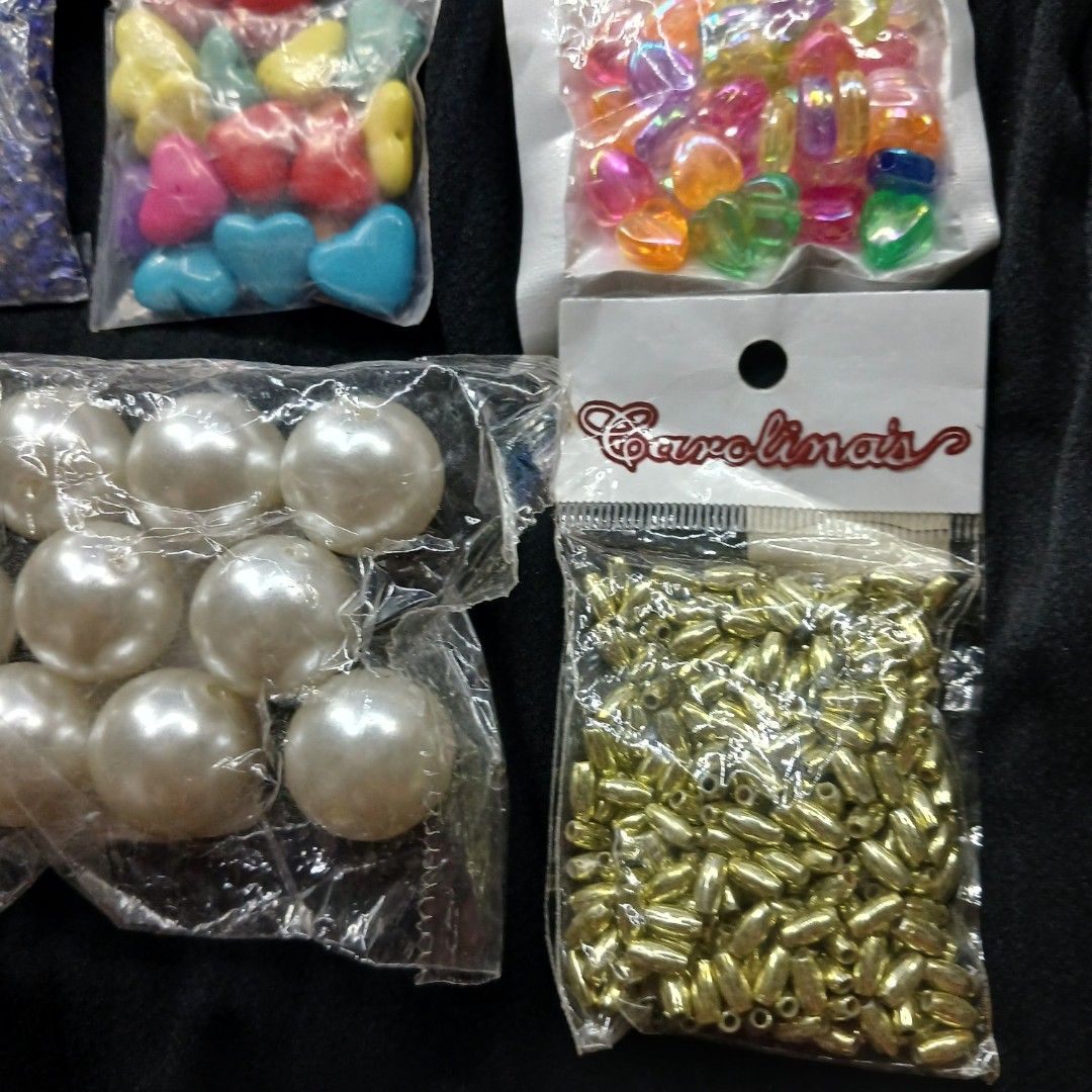 Take All - Bundle of Mixed Beads (Set 3) (Category: Craft Supplies & Tools) located in Malabon City. Submitted by 250andBelowCo (Listing ID 1395435286, Image 2). Description: Set 3 - Bundle of mixed beads. Different sizes and styles. Mix of acrylic, shaped, pearl (imitation, large!) metallic, frosted, etc. Please check pictures! RFS: Too many supplies, need to declutter. Color of actual product might vary from screen. Please manage your expectati