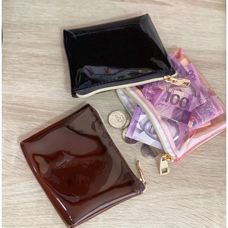 TAKE ALL PVC mini wallet/coinpurse (Category: Cases & Sleeves) located in Pasig City. Submitted by dai_clutter (Listing ID 1395380497, Image 3). Description: - PVC Mini Wallet/Coinpurse - Includes 1 black coinpurse and 1 black mini wallet with card slot - Transparent design - Durable PVC material - Lalamove/Grab pickup only.
