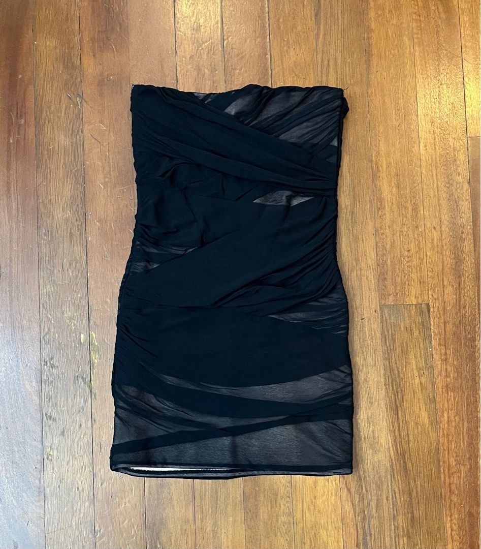 Topshop Black Strapless Dress (Category: Dresses) located in Manila. Submitted by graciesbits (Listing ID 1395472930, Image 1). Description: - Topshop black strapless dress - Ruched design with mesh overlay - Features a back zipper closure - UK size 6 / EUR 38 / US size 10.