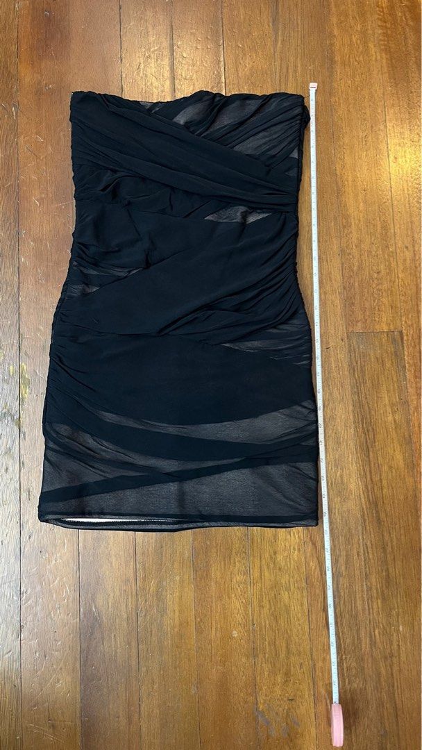Topshop Black Strapless Dress (Category: Dresses) located in Manila. Submitted by graciesbits (Listing ID 1395472930, Image 2). Description: - Topshop black strapless dress - Ruched design with mesh overlay - Features a back zipper closure - UK size 6 / EUR 38 / US size 10.