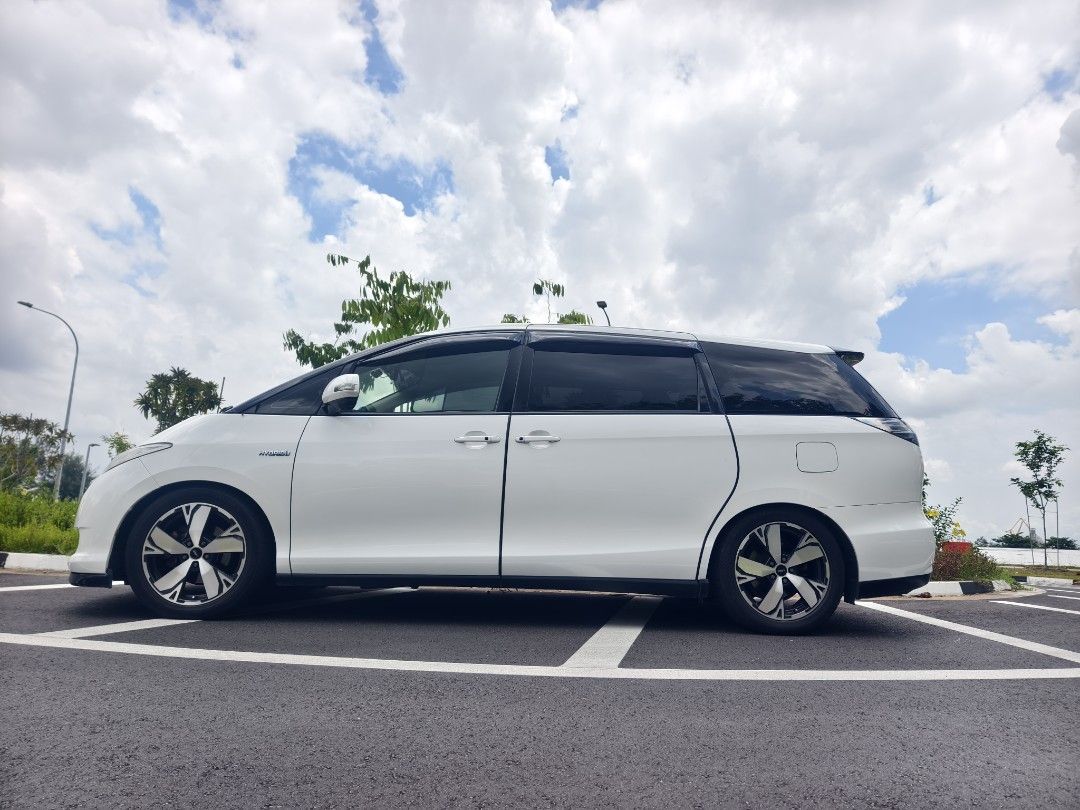 Toyota Estima Hybrid 2.4X A Auto (Category: Used Cars) located in Singapore. Submitted by ridestuff (Listing ID 1395481900, Image 3). Description: Family car. Well maintained under our care. Changed/Repaired steering rack, lower arms, inverter, hybrid battery, abs pump, radiator, cooling fans. Just serviced, tyres plenty of life. Brand new hybrid battery with warranty and invoice. Letting go with number plate SGT 8884A..
