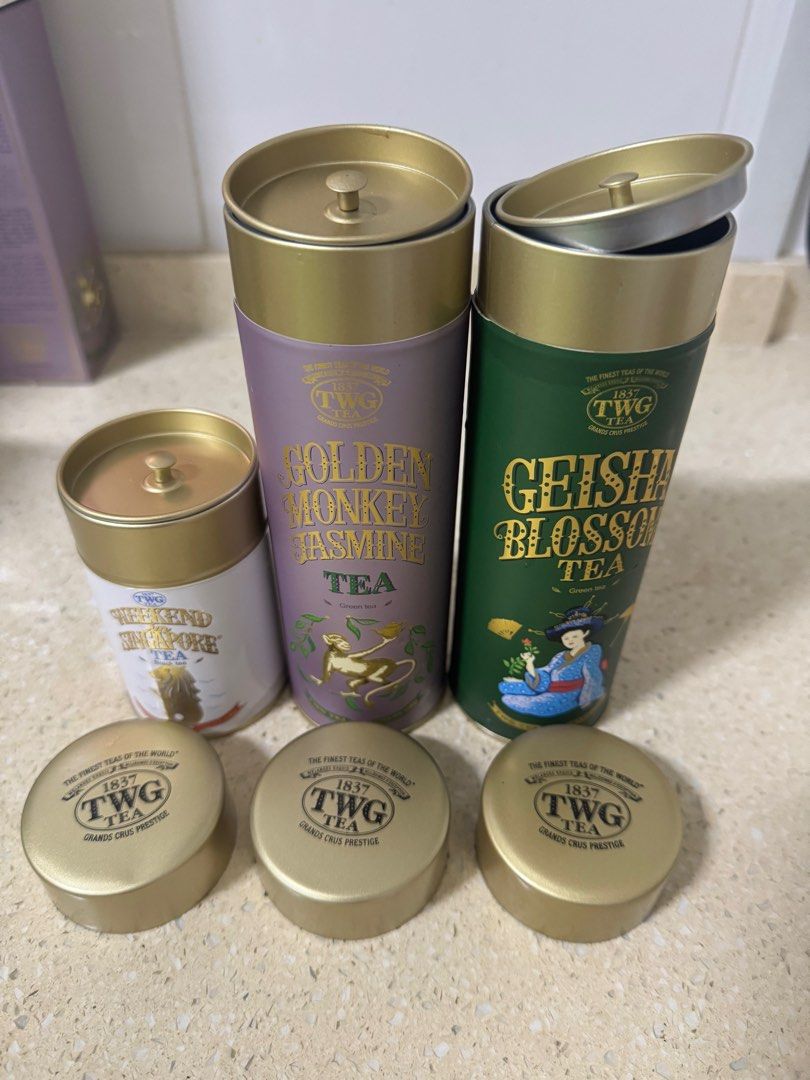 TWG Tea Empty Tins (Category: Beverages) located in Singapore. Submitted by ycl0123 (Listing ID 1395447708, Image 2). Description: - Set of three TWG tea empty tins. - Condition is like new. Not used before. - Big one $15 each, capacity for 100g tea leaves - Small one $6, capacity for 50g tea leaves. Self collect at Yishun MRT station..