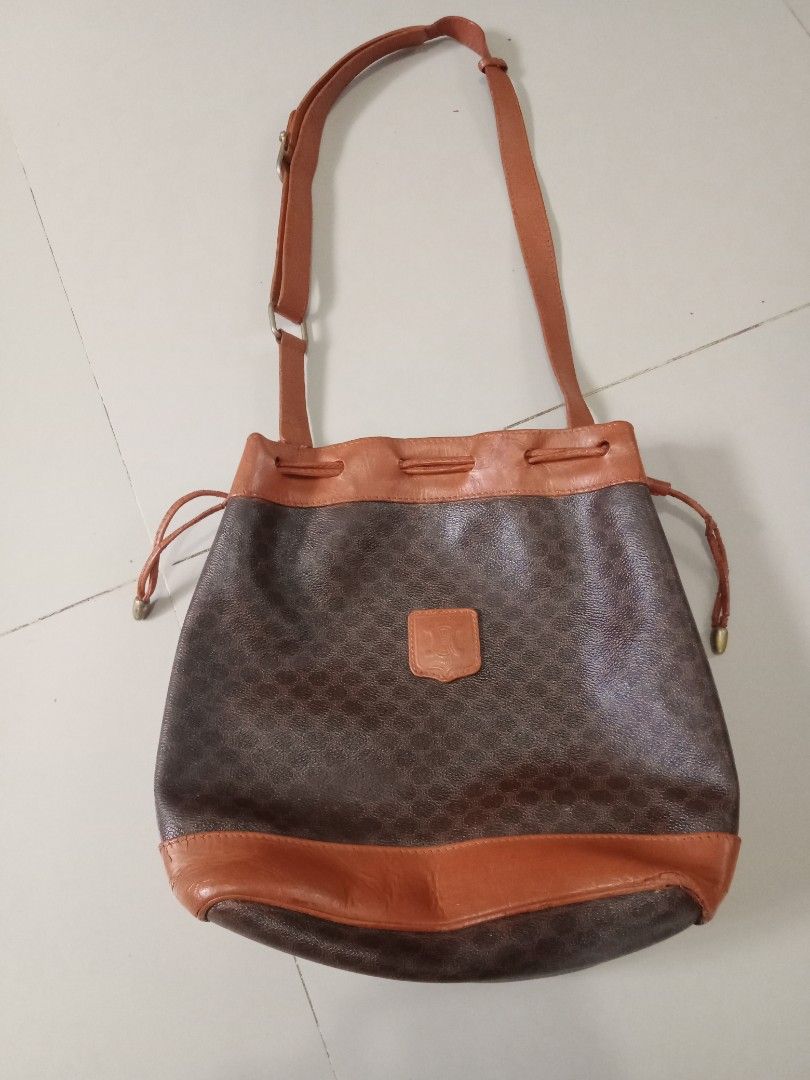 Vtg Celine bucket sling bag (Category: Luxury Bags & Wallets) located in Santo Tomas. Submitted by rexadominice (Listing ID 1395402072, Image 1). Description: heavy leather material wearable.