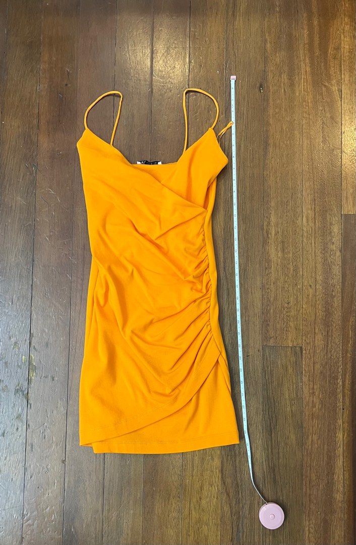 Zara Orange Mini Dress XS (Category: Dresses) located in Manila. Submitted by graciesbits (Listing ID 1395472931, Image 1). Description: - Zara mini dress - Vibrant orange color - Size: XS (fits S) - Stretchy Fabric - No issues .