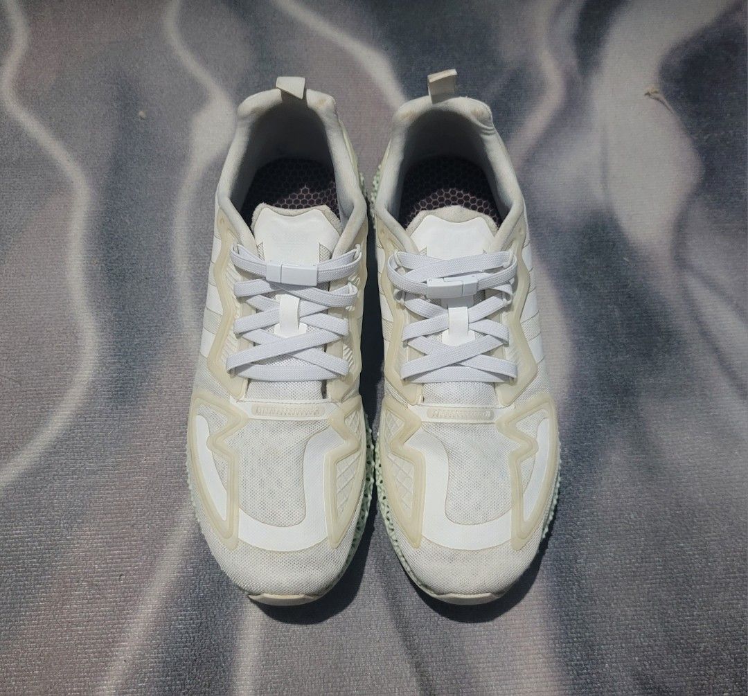 Adidas ZX 2K 4D Cloud White US 9.5 (Category: Sneakers) located in Marikina City. Submitted by vesuv (Listing ID 1390432666, Image 2). Description: Adidas ZX 2K 4D Cloud White US 9.5 Price: 3,499 SIZE: US 9.5 Rarely used; still presentable. NO box. Has magnetic shoe laces, will include original laces. RFS: Too many shoes, needs to declutter. Check first pic for Reversible reference. Location: Marikina Meet-up: Marikina (Concepcion, Meralco) Deliv