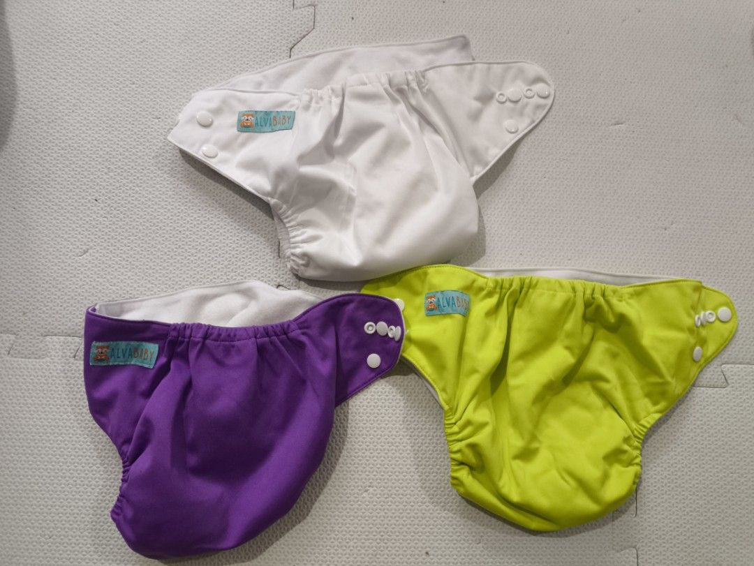 Cloth Diapers bundle (Category: Diapers & Baby Wipes) located in Paranaque City. Submitted by mmonicascloset (Listing ID 1390571236, Image 2). Description: Bundle of Alvababy Cloth diapers condition: Good as new. minimal flaws dahil sa storage. Used once yung isang set but the rest is new pa. This bundle includes: 4 cloth diaper covers (pink, white, purple, green) 4 liners Location WEST SERVICE ROAD Paranaque Metro Manila area only.
