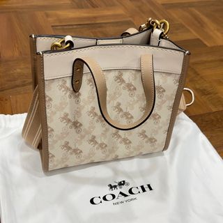 Carousell Coach Jes Drawstring Bucket Bag With Horse And Carriage