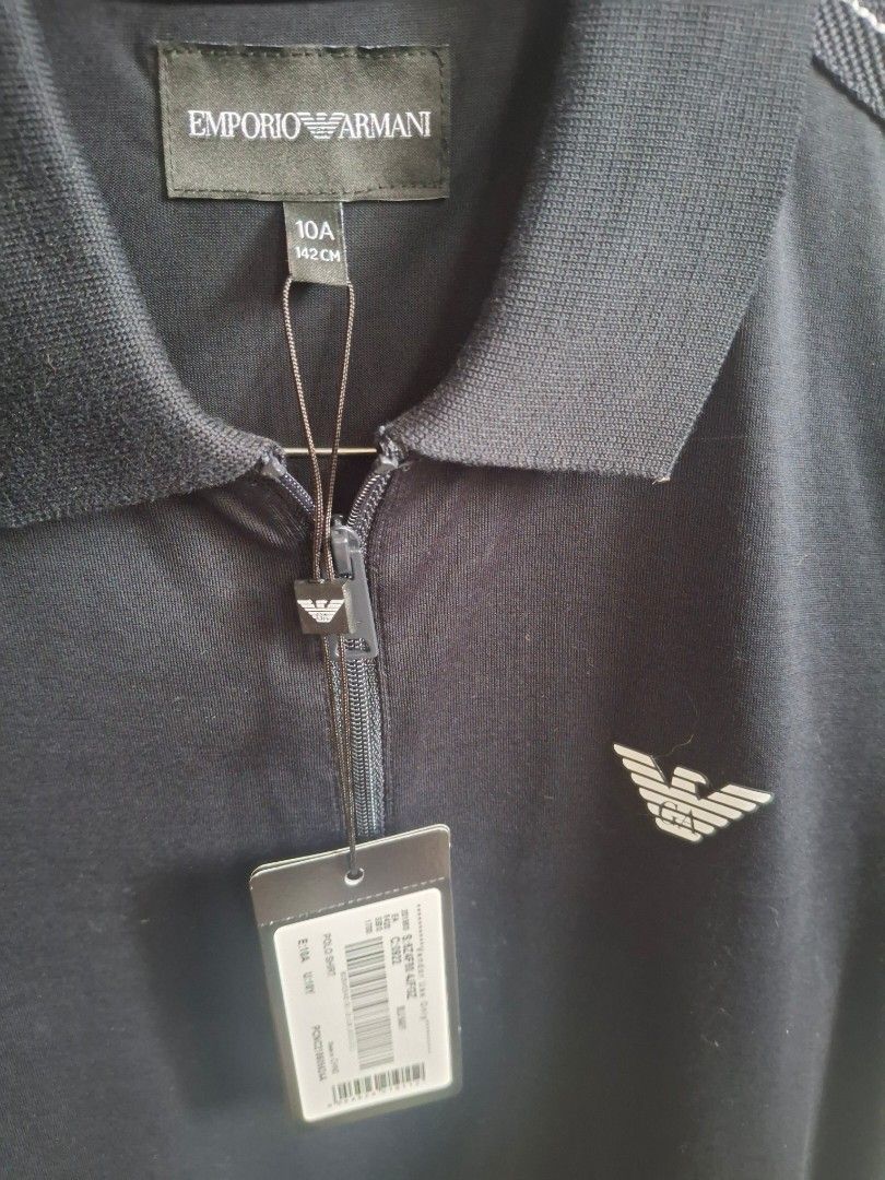 Emporio Armani (Category: Babies & Kids Fashion) located in Bulacan. Submitted by stacksonracks_ph (Listing ID 1390511994, Image 2). Description: Color: Black Length: 21 inches Width: 15.5 inches Sleeve length: 7 inches.